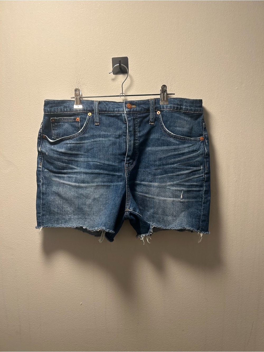 Madewell dark blue denim shorts with frayed hem